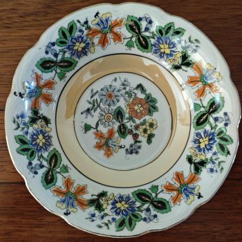 Schaaltjes rond met uitbundig bloemenmotief. Per set van 6.