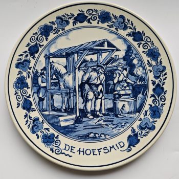 Royal Goedewaagen,  "Blue Delft". Handwork Holland.  Wandbord Beroepen. De Hoefsmid.